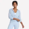 Giacca con cappuccio e zip integrale Shine Giacca con cappuccio e zip integrale Shine