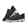 Go Walk 5 Low-Top “Black Orange”