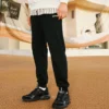 Pantaloni in tessuto “Black”
