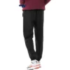 Pantaloni in tessuto con logo stampato “Black”