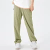 Pantaloni sportivi elasticizzati a vita alta con stampa a lettere “Nero Verde oliva”